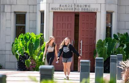 students walking out of College of Education